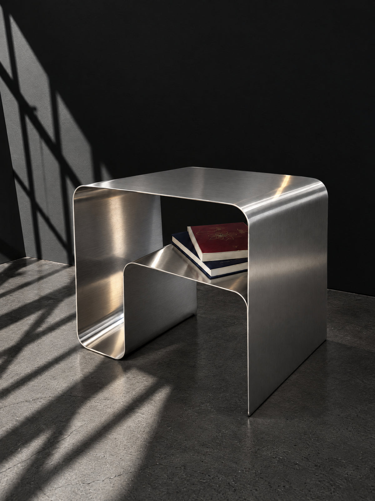 Vela Steel Waterfall Table — brushed steel waterfall side table