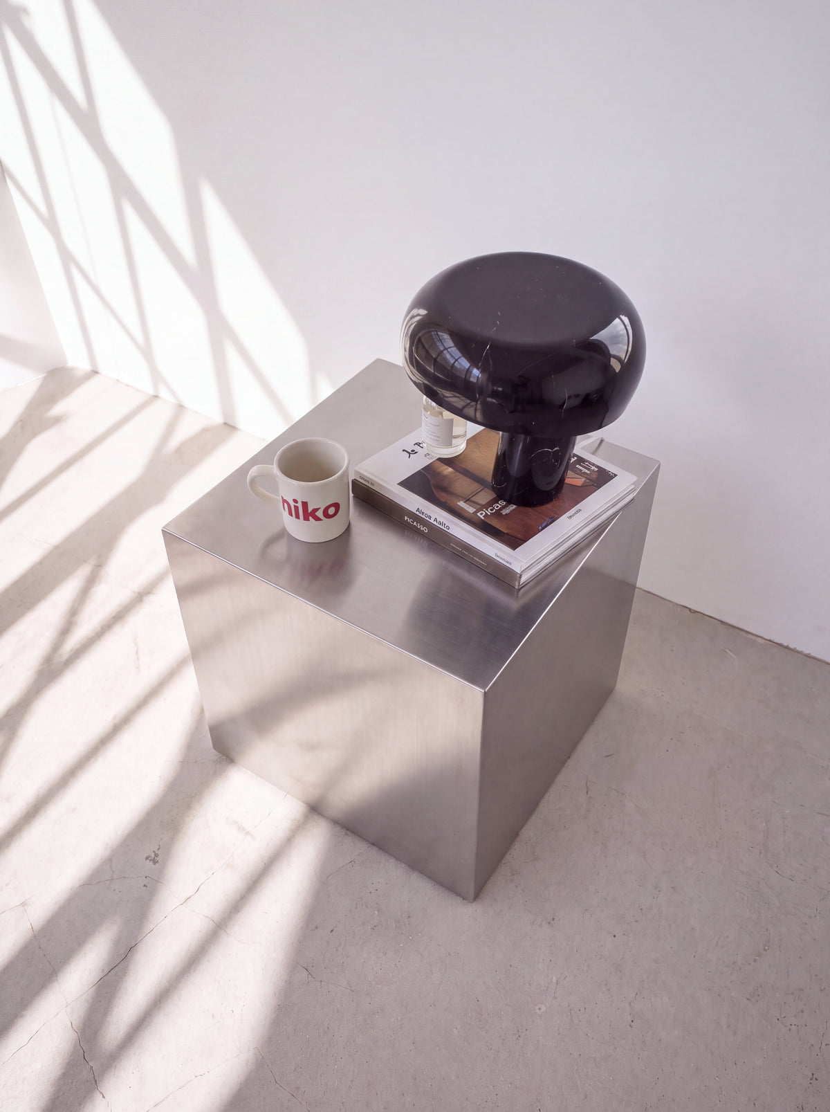 Blok Steel Side Table — steel side table, three-quarter view from the left