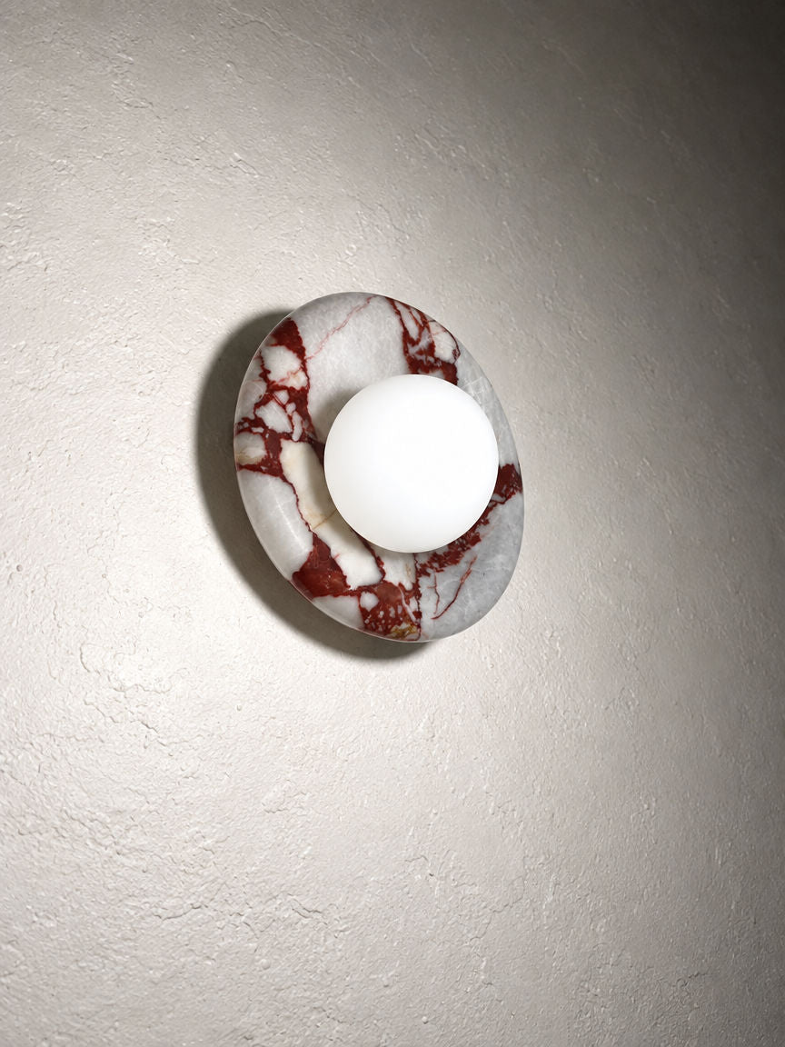 Orba Marble Wall Sconce in Calacatta Red seen from below left