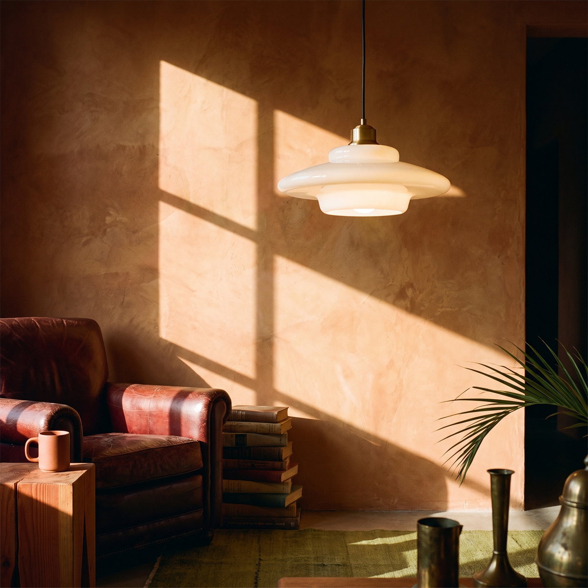 White Glass Pendant Light in a lived-in interior