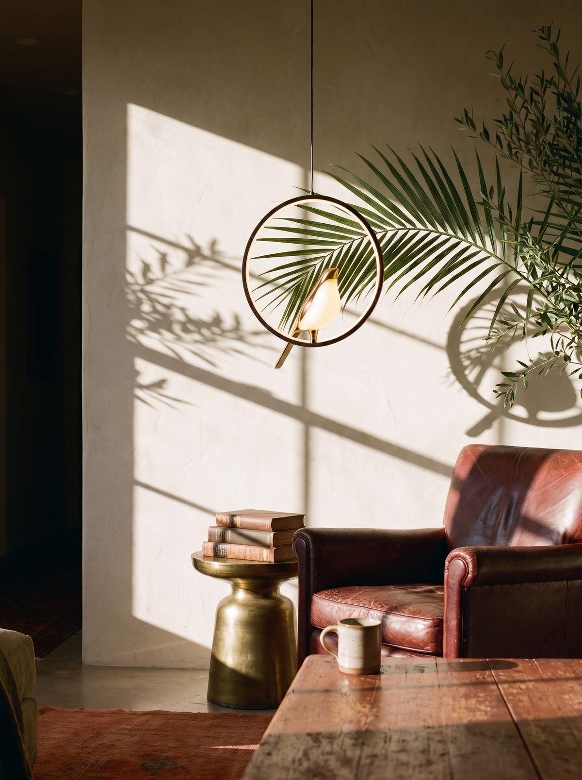 Magpie Pendant Light hanging in a warm room