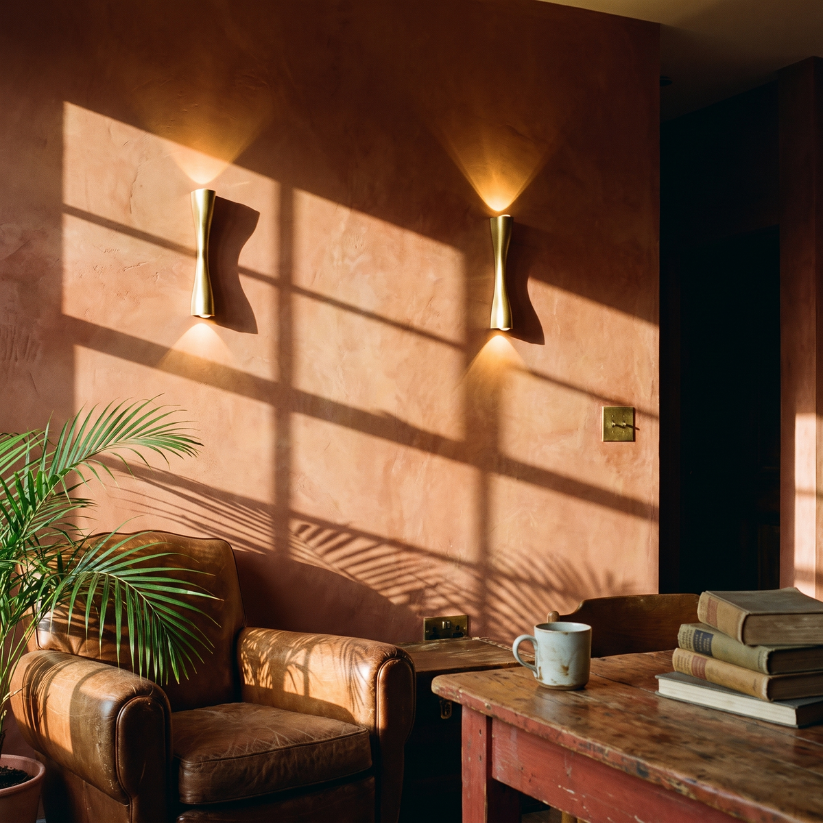 Modern Gold Wall Light in a lived-in interior