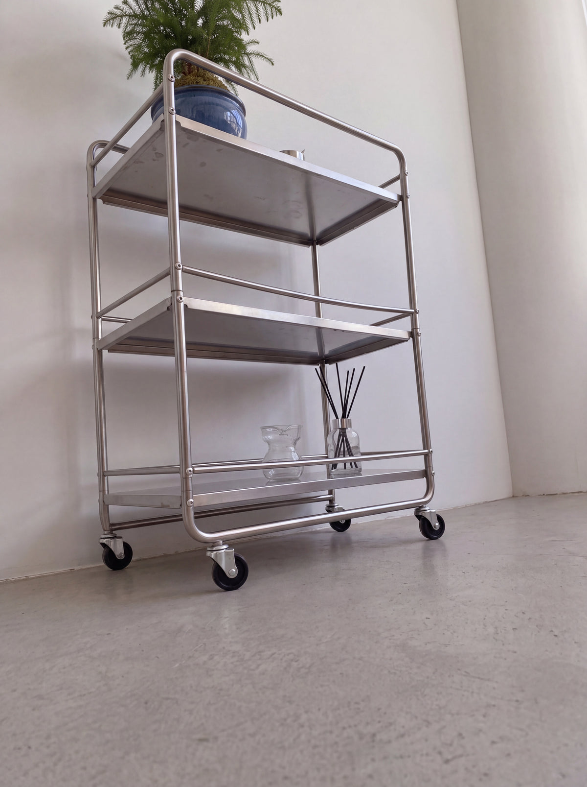 Ovi Rolling Steel Cart — rolling steel cart, low three-quarter view